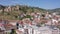 Flight over of the old town on Sololaki hill, crowned with Narikala fortress, the Kura river and old buildings and city