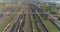 Flight over the railway depot. Freight trains at the depot. Large industrial railway depot top view.