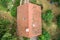 Flight over the red roof of a single family house with a chimney and a satellite antenna for inspection, control and preparation f