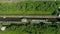 Flight over the river. Passage of hydraulic locks on the channel by commercial cargo ship