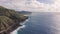 Flight over rocky coast of tropical island of Oahu Hawaii. Kalanianaole Highway South Shore Oahu Hawaii Pacific Ocean