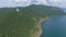 Flight over the rocky shore of lake. Green Forest. Observatory. Drone video 4k footage. Landscape. Coastline.