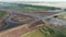 Flight over the traffic intersection. Transport interchange of highways. Road under construction. Beautiful view. A