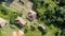 Flight from a roof of a house in a rural mountain village