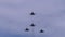 A flight of Russian combat aircraft flying in the sky, an attack from the air.