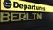 Flight to Berlin on international airport departures board. Travelling to Germany conceptual 3D rendering