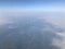 The flight wing span from the flight window showing ground