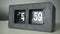 Flip clock shows it`s 5 a.m. time