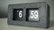 Flip clock shows it`s 7 a.m. time