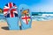 Flip flops with Fijian flag on the beach. Fiji resorts, vacation, tours, travel packages concept. 3D rendering