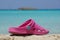 Flip-flops on a sunny pile of sand . beach slipper on the beach