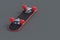 Flipped skateboard on gray background. Hobbie and leisure
