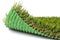 Flipped Up Section of Artificial Turf Grass On White Background