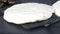 Flipping a pancake closeup, slow motion