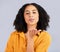 Flirty, happy and a portrait of a woman blowing kiss isolated on a studio background. Love, smile and a flirtatious girl