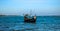 Floating boat in deep blue sea in coast of Saint Martin Island of Bangladesh