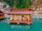 Floating bungalows at Khao Sok Thailand, drone view at the lake with couple in front of bungalow