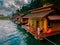 Floating bungalows at Khao Sok Thailand, drone view at the lake with couple in front of bungalow