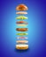 Floating burger ingredients on the blue background