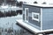 Floating cabin on the begins to freeze lake