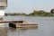 Floating concrete pier pontoon in river