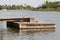 Floating concrete pier pontoon in river