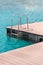 Floating dock with composite deck and ladder at the marina