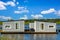 Floating fishing cabins on the lake water