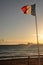 Floating French Flag on a Beach of La Ciotat at Sunset