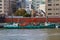 Floating garbage collecting boats at anchor on the Sumida River