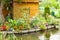 Floating gardens very flowery in the spring between the canals, Hortillonnages in Amiens in France