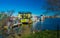 Floating Home Village colorful Houseboats Water Taxi Fisherman`s Wharf Reflection Inner Harbor, Victoria British Columbia Canada