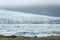 Floating icebergs melting in Fjallsarlon glacier lake, Iceland