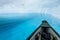 Floating in an inflatable canoe on a supraglacial lake on the Matanuska Glacier in Alaska