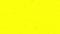 Floating miniature motes on a bright yellow background, seamless loop. Animation. Randomly dynamically moving particles