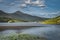 Floating nenuphars on Lough Gummeenduff in beautiful Black Valley at sunset