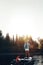 Floating through paradise. a young woman paddle boarding on a lake.