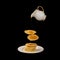 Floating pieces of pancakes on a pancake stack with honey dripping from a levitating white ceramic jug