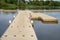 Floating plastic boat dock on the cove in Weathersfield CT