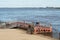 Floating pontoon pier on the embankment of the city of Blagoveshchensk. Ships on the Amur River. Increased water level.