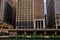 Floating prairie ecosystems foreground on Chicago River which are between fishing piers, with views of both Upper and Lower Wacker