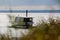 Floating sauna with seagul in the sea