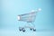 Floating Shopping Cart on Solid Light Background AI Generated