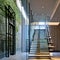 Floating Stairway: A breathtaking foyer with a floating staircase made of glass and steel, creating an illusion of weightlessnes