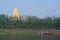 Floating Town and golden stupa in Kanchanaburi Thailand.