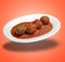 Floating White plate with Beef meats balls and tomato sausage