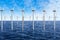 Floating wind turbines installed in sea under sky. Alternative energy source