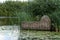 Floating wooden cradle on water