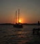 Floating yacht silhouette at dawn