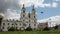 A flock of doves flying near an Orthodox church. Ð¡athedral Belarus Minsk